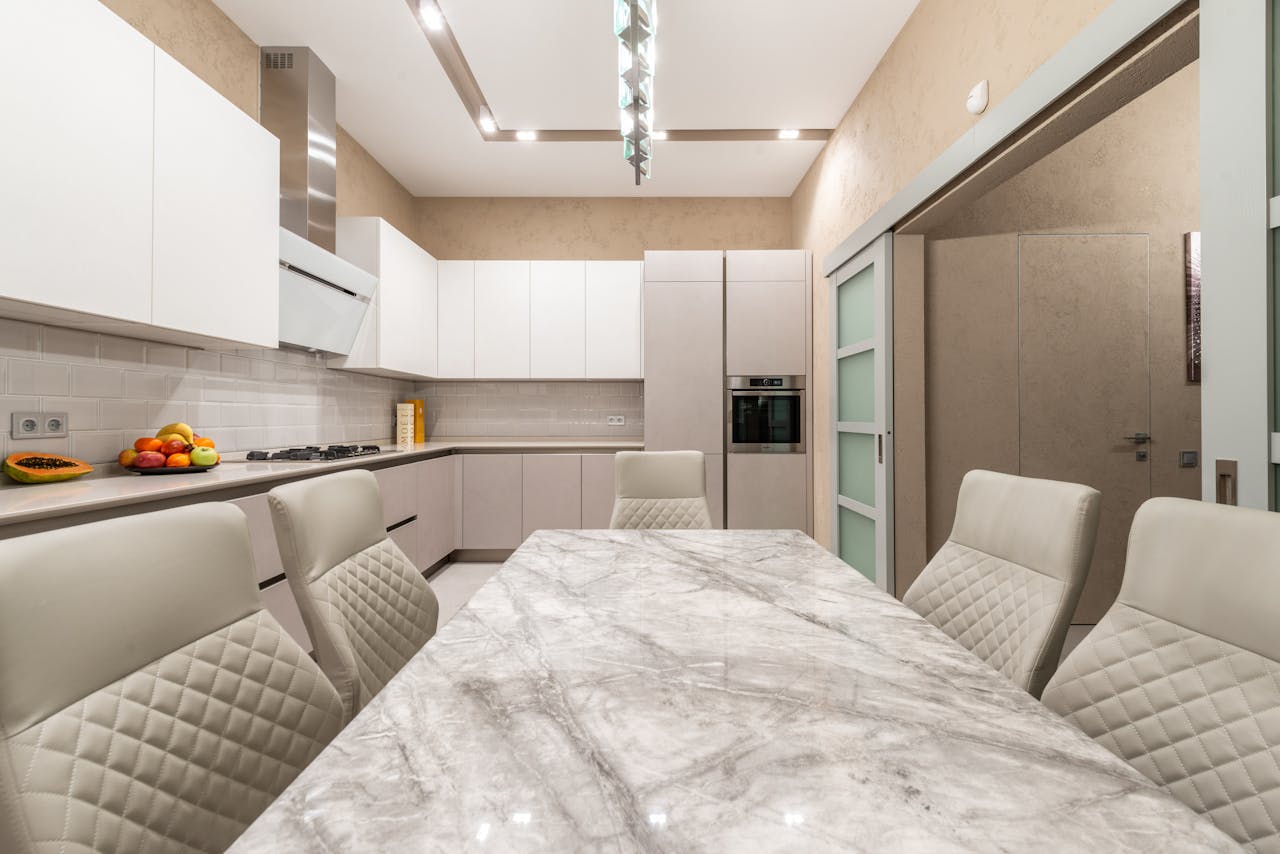 A bright white quartz kitchen in a newly built Northwest Las Vegas home